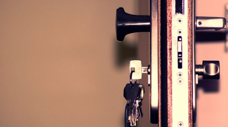 Detailed view of a door lock and keys emphasizing security and access. - Photo by George Becker on Pexels